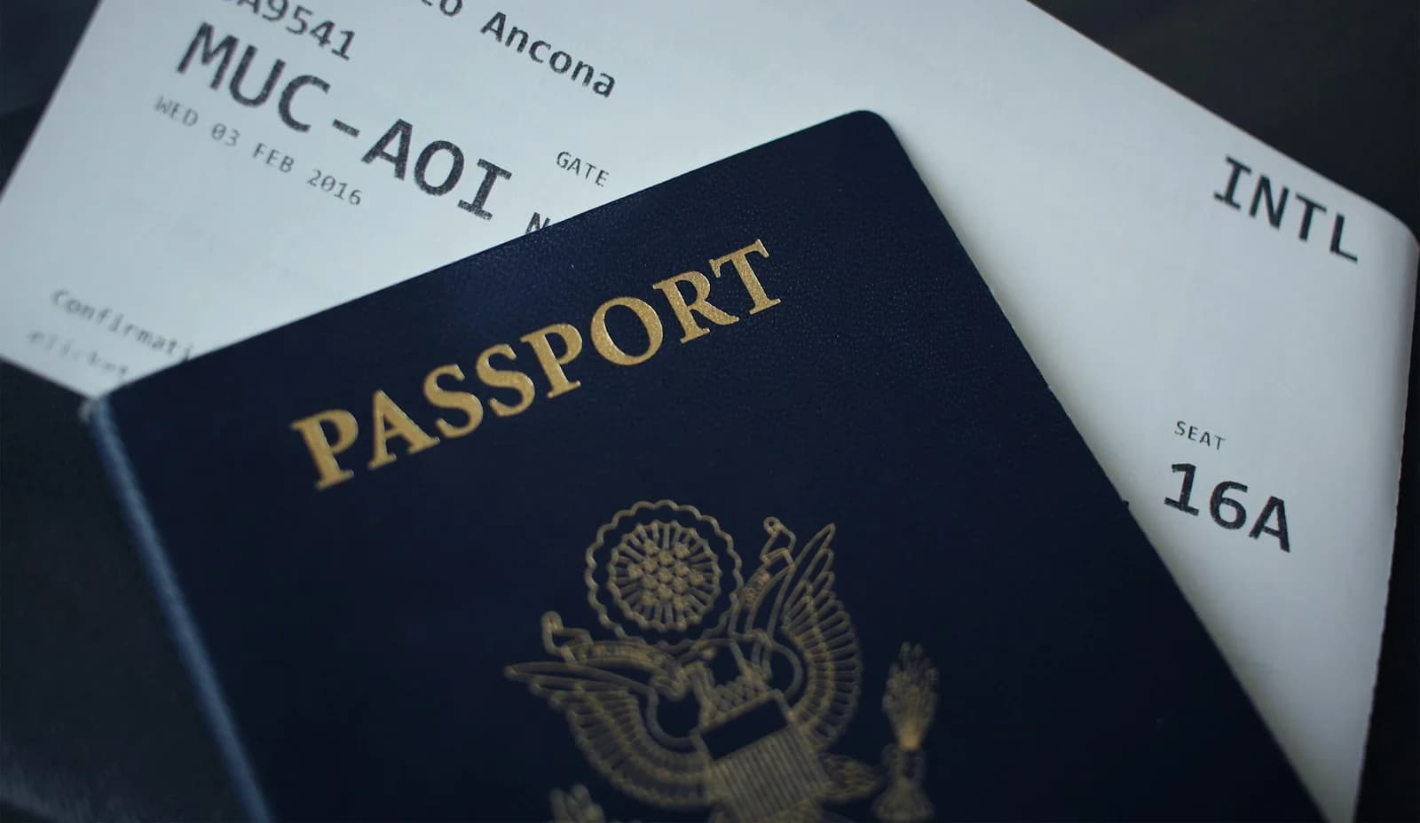 Illustrative travel documents: US passport, not an Indonesian visa